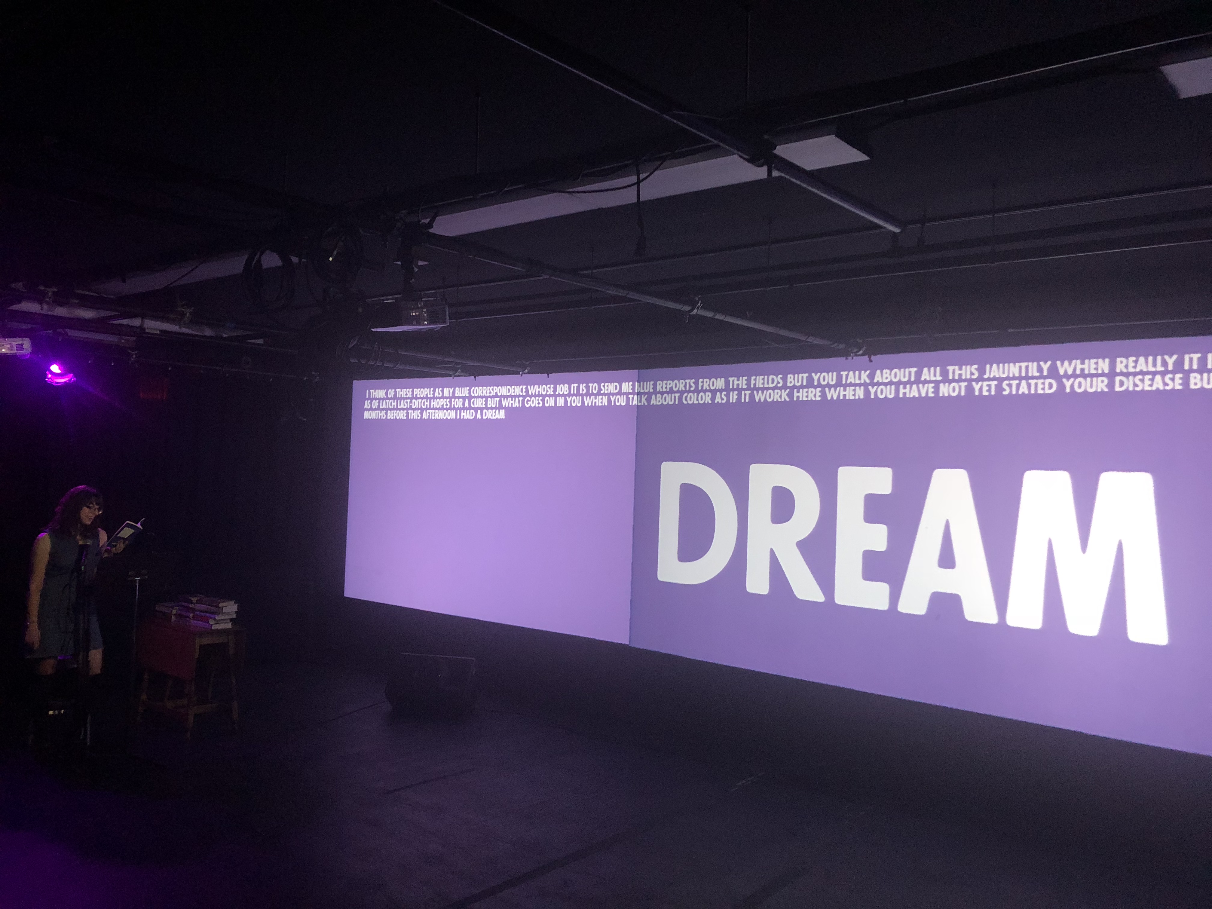 The word DREAM projected large with a purple background